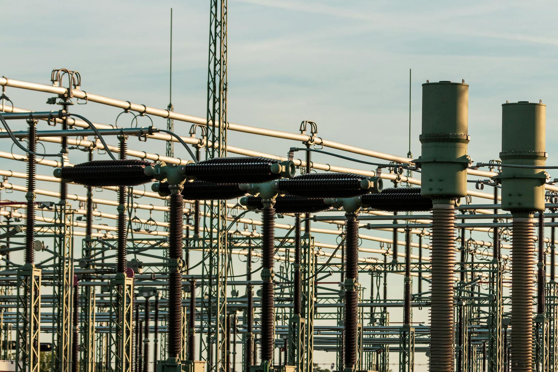 High voltage electrical substation equipment with insulators and conductors